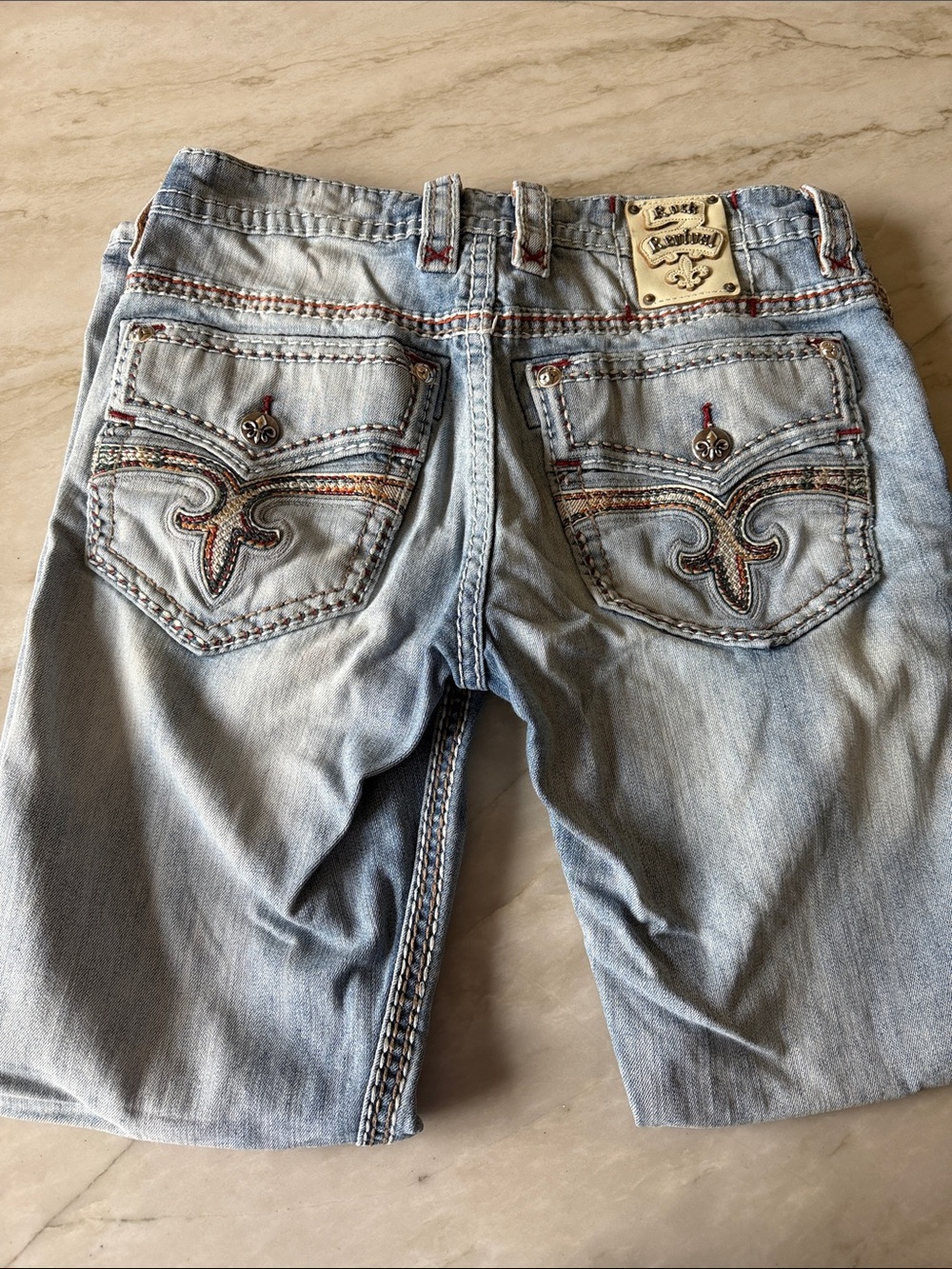 Light Wash Men’s Rock Revival Jeans with Decorative Back Pockets